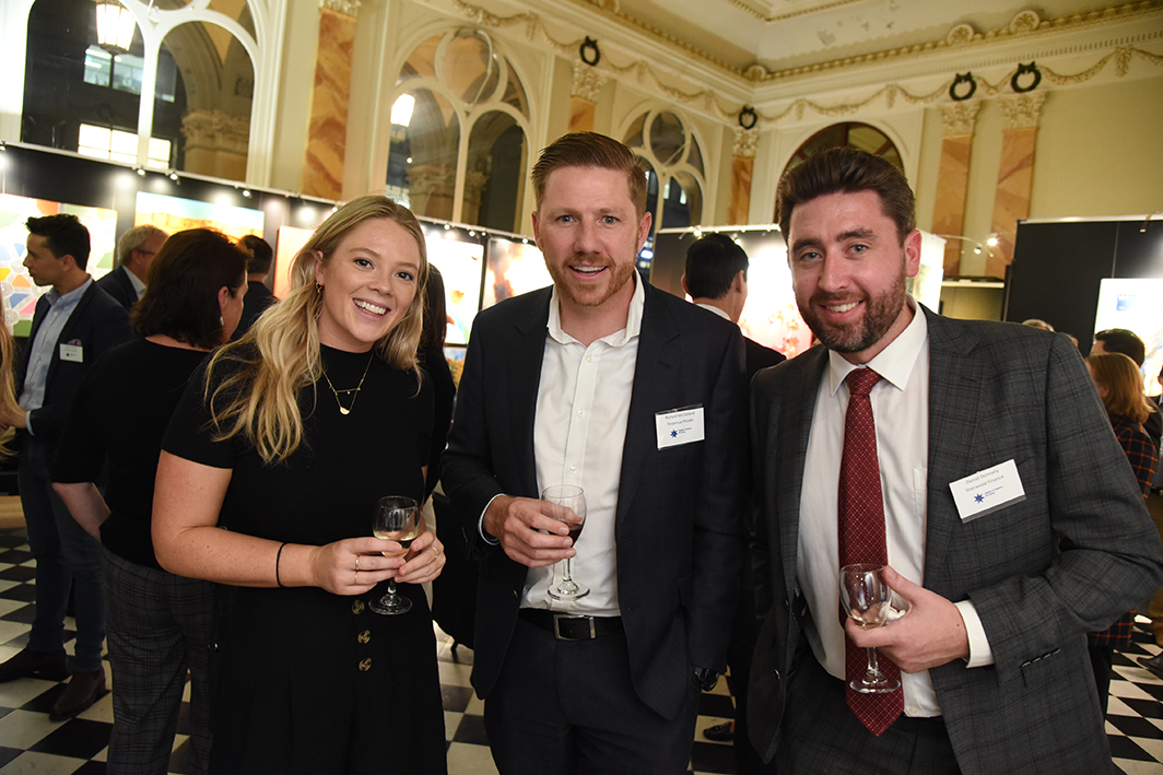 People smiling at camera - After 5 Networking